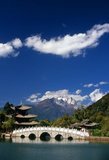 Black Dragon Pool, built in 1737 during the Qing period, is located slightly to the north of Lijiang's Old Town and offers one of China's most spectacular views.<br/><br/>

Jade Dragon Snow Mountain is a small mountain range) near Lijiang, in Yunnan province of southwestern China. Its highest peak is named Shanzidou (5,596 m or 18,360 ft). The far side of the mountain forms one side of Tiger Leaping Gorge (Hutiao Xia).